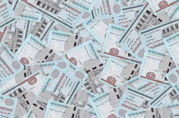 5 Mısır sterlinli banknotlar büyük yığınlar halinde duruyor. Zengin yaşam kavramsal geçmişi. Büyük miktarda para.