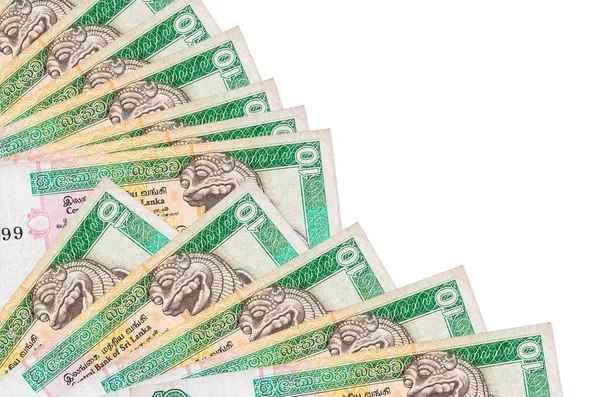 10 Sri Lanka Rupisi banknotları beyaz arka planda izole edilmiş bir şekilde duruyor ve fotokopi alanı da vantilatöre yakın duruyor. Maaş zamanı kavramı veya finansal işlemler
