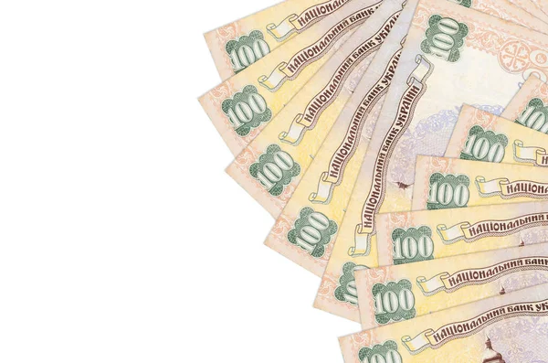 100 tane Ukrayna hrivniası banknotu beyaz arka planda fotokopi uzayı ile izole edilmiş olarak yatıyor. Zengin yaşam kavramsal geçmişi. Büyük miktarda ulusal para birimi zenginliği