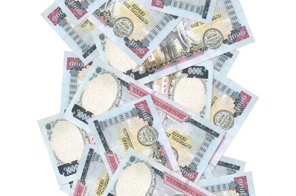 Beyaz üzerine izole edilmiş 1000 Nepal rupisi. Birçok banknot sol ve sağ tarafta beyaz kopya alanı ile düşüyor