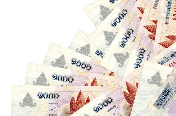 1000 Kamboçyalı isyan yasası beyaza izole edilmiş farklı bir sırayla yatıyor. Yerel bankacılık ya da para kazanma konsepti. İş arkaplanı afişi