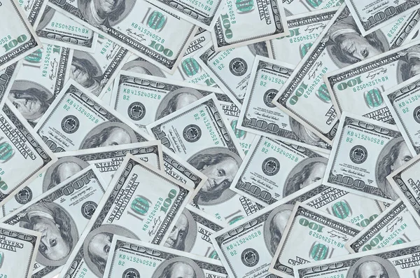 100 dolarlık banknotlar büyük yığın halinde duruyor. Zengin yaşam kavramsal geçmişi. Büyük miktarda para.