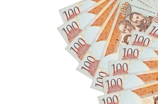 100 Dominik pezosu fotokopi alanı olan beyaz arka planda duruyor. Zengin yaşam kavramsal geçmişi. Büyük miktarda ulusal para birimi zenginliği