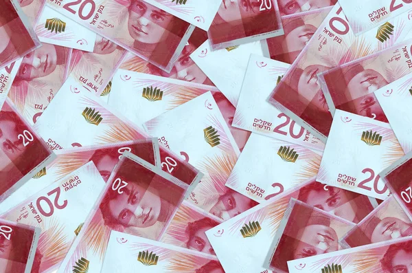 20 İsrailli yeni şekel banknot büyük bir yığın halinde duruyor. Zengin yaşam kavramsal geçmişi. Büyük miktarda para.
