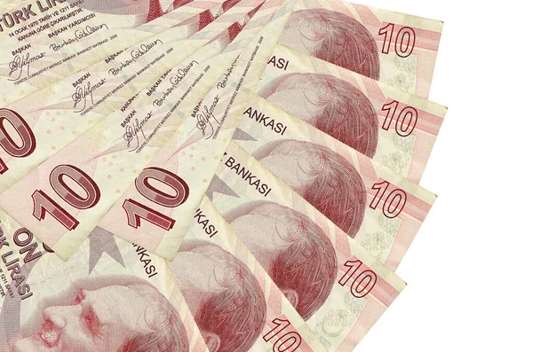 10 Türk lireti banknotları beyaz zemin üzerinde izole edilmiş, fotokopi alanı ise fan şeklinde üst üste yığılmış. Finansal işlemler kavramı