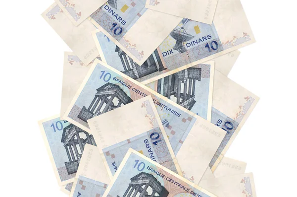 10 Tunus dinarı banknotları beyazın üzerinde izole bir şekilde uçuyor. Birçok banknot sol ve sağ tarafta beyaz kopya alanı ile düşüyor