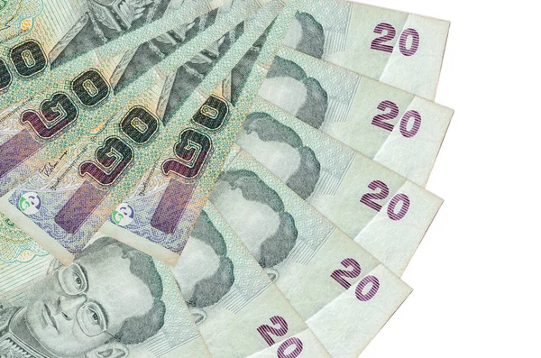 20 Tayland Baht banknotu beyaz arka planda izole edilmiş bir şekilde duruyor ve fotokopi alanı fan şeklinde dizilmiş. Finansal işlemler kavramı