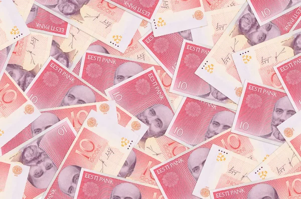 10 Estonya kroon banknotu büyük bir yığın içinde yatıyor. Zengin yaşam kavramsal geçmişi. Büyük miktarda para.