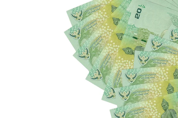 20 Tayland Baht banknotu beyaz arka planda fotokopi alanı ile izole bir şekilde duruyor. Zengin yaşam kavramsal geçmişi. Büyük miktarda ulusal para birimi zenginliği