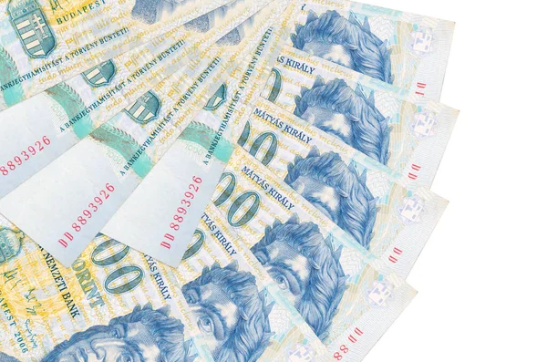 1000 Macar forint banknotu beyaz arka planda izole edilmiş ve hayran şeklinde fotokopi alanı da yakın planda duruyor. Finansal işlemler kavramı