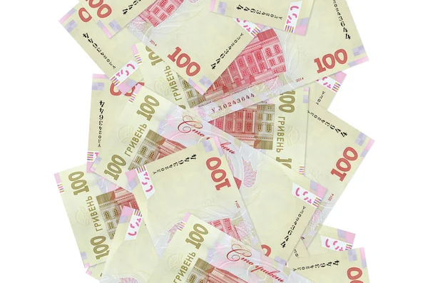 Beyaz üzerinde izole edilmiş 100 Ukrayna hrivniası banknotu. Birçok banknot sol ve sağ tarafta beyaz kopya alanı ile düşüyor