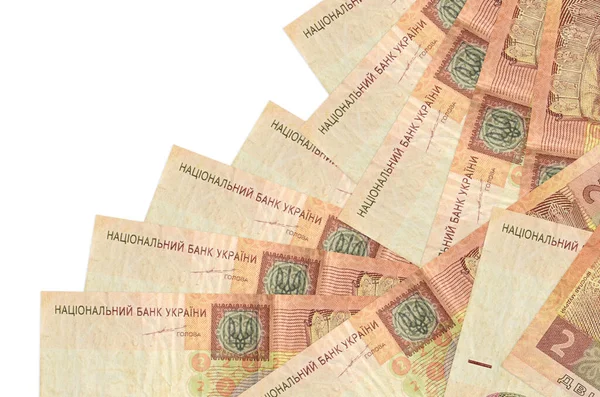 İki Ukrayna hrivniası banknotu beyazın üzerinde ayrı bir sırayla yatar. Yerel bankacılık ya da para kazanma konsepti. İş arkaplanı afişi