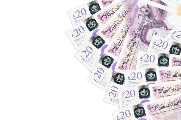 20 İngiliz sterlinli banknotlar beyaz arka planda, fotokopi alanı ile izole edilmiş. Zengin yaşam kavramsal geçmişi. Büyük miktarda ulusal para birimi zenginliği