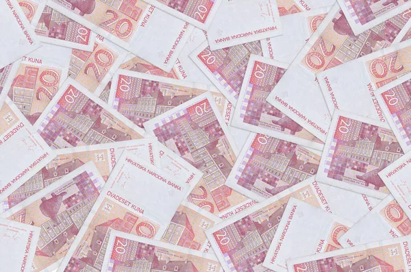 20 Hırvat kuna faturası büyük bir yığın halinde duruyor. Zengin yaşam kavramsal geçmişi. Büyük miktarda para.