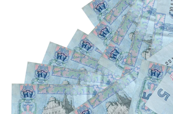 5 Ukrayna hrivniası banknotu beyazın üzerinde ayrı bir sırayla yatıyor. Yerel bankacılık ya da para kazanma konsepti. İş arkaplanı afişi