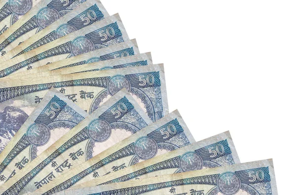 50 Nepal Rupisi banknotları beyaz arka planda izole edilmiş, fotokopi alanı da pervaneye yakın duruyor. Maaş zamanı kavramı veya finansal işlemler