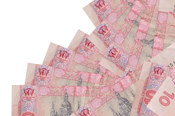 10 Ukrayna hrivniası banknotu beyazın üzerinde ayrı bir sırayla yatıyor. Yerel bankacılık ya da para kazanma konsepti. İş arkaplanı afişi