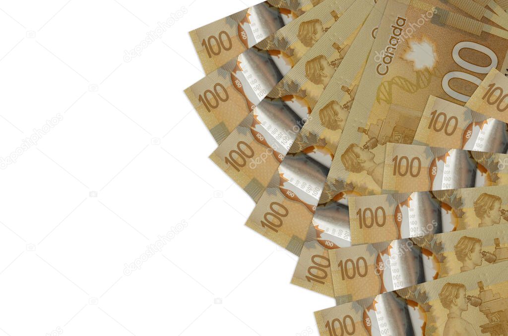 100 Canadian dollars bills lies isolated on white background with copy space. Rich life conceptual background. Big amount of national currency wealth