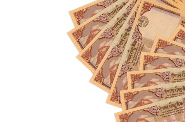 10 Nepal Rupisi banknotları beyaz arka planda, fotokopi alanı ile izole bir şekilde duruyor. Zengin yaşam kavramsal geçmişi. Büyük miktarda ulusal para birimi zenginliği