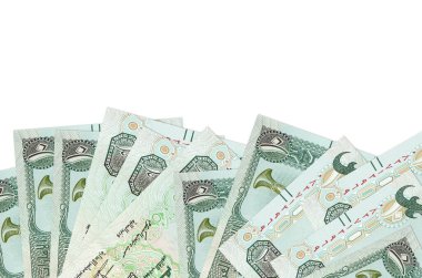 Ekranın alt tarafında 10 BAE dirhem banknotu var. Beyaz arka planda izole edilmiş ve kopyalama alanı var. Paralı iş kavramları için arkaplan afişi şablonu
