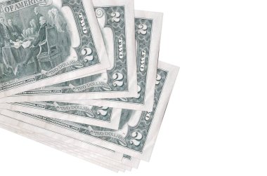 2 Amerikan doları küçük gruplar halinde ya da beyaz paketler halinde yatar. Kopyalama alanı olan bir model. İş ve para değişimi kavramı