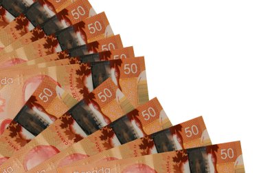 50 Kanada Doları beyaz arka planda izole edilmiş bir şekilde duruyor ve fotokopi alanı da vantilatörde duruyor. Maaş zamanı kavramı veya finansal işlemler