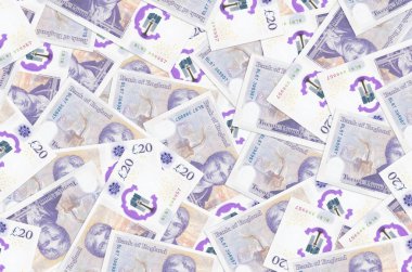 20 İngiliz sterlinlik banknotlar yığınla var. Zengin yaşam kavramsal geçmişi. Büyük miktarda para.
