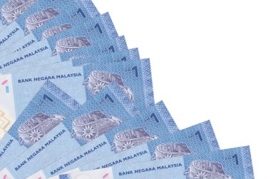 1 Malezya ringgit banknotları beyaz arkaplanda izole edilmiş, fotokopi alanı da pervaneye yakın duruyor. Maaş zamanı kavramı veya finansal işlemler
