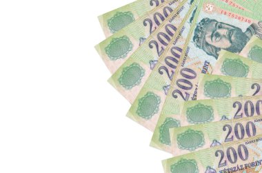 200 Macar forint banknotları beyaz arka planda fotokopi alanı ile izole edilmiş yatar. Zengin yaşam kavramsal geçmişi. Büyük miktarda ulusal para birimi zenginliği