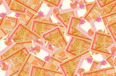 100 Sri Lanka rupisi büyük bir yığın halinde duruyor. Zengin yaşam kavramsal geçmişi. Büyük miktarda para.