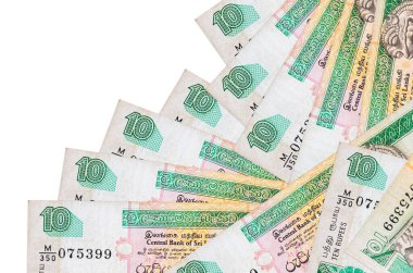 10 Sri Lanka rupisi banknotları beyaza izole edilmiş farklı bir sırayla yatar. Yerel bankacılık ya da para kazanma konsepti. İş arkaplanı afişi