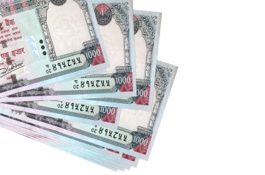 1000 Nepal rupisi küçük gruplar halinde ya da beyaz paketler halinde yatar. Kopyalama alanı olan bir model. İş ve para değişimi kavramı