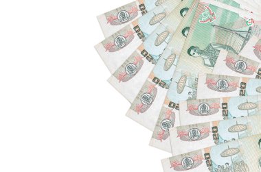 20 Tayland Baht banknotu beyaz arka planda fotokopi alanı ile izole bir şekilde duruyor. Zengin yaşam kavramsal geçmişi. Büyük miktarda ulusal para birimi zenginliği