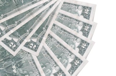 2 Amerikan doları banknotlar beyaz arka planda izole bir şekilde duruyor ve fotokopi alanı da yakın planda. Finansal işlemler kavramı