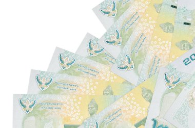 20 Tayland Baht banknotu beyaza izole edilmiş farklı bir sırayla yatar. Yerel bankacılık ya da para kazanma konsepti. İş arkaplanı afişi