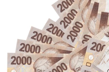 2000 Endonezya rupiası banknotları beyaza izole edilmiş farklı bir sırayla yatar. Yerel bankacılık ya da para kazanma konsepti. İş arkaplanı afişi