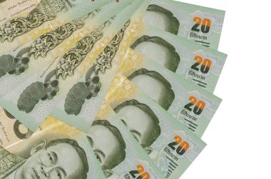 20 Tayland Baht banknotu beyaz arka planda izole edilmiş bir şekilde duruyor ve fotokopi alanı fan şeklinde dizilmiş. Finansal işlemler kavramı