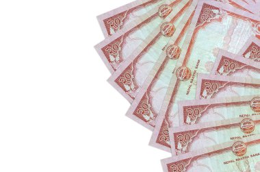 20 Nepal Rupisi banknotları beyaz arka planda, kopyalama alanı ile izole bir şekilde duruyor. Zengin yaşam kavramsal geçmişi. Büyük miktarda ulusal para birimi zenginliği