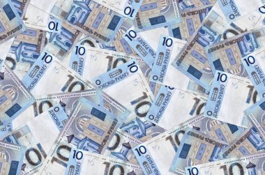 10 Belorus rublesi banknotları büyük bir yığın halinde duruyor. Zengin yaşam kavramsal geçmişi. Büyük miktarda para.