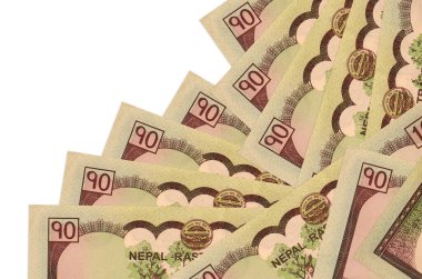 10 Nepal Rupisi banknotları beyaza izole edilmiş farklı bir sırayla yatar. Yerel bankacılık ya da para kazanma konsepti. İş arkaplanı afişi