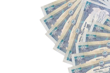 50 Nepal Rupisi banknotları beyaz arka planda fotokopi alanı ile izole bir şekilde duruyor. Zengin yaşam kavramsal geçmişi. Büyük miktarda ulusal para birimi zenginliği