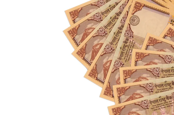 10 Nepal Rupisi banknotları beyaz arka planda, fotokopi alanı ile izole bir şekilde duruyor. Zengin yaşam kavramsal geçmişi. Büyük miktarda ulusal para birimi zenginliği