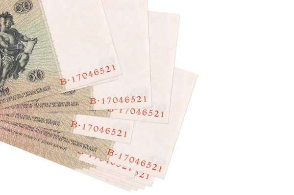 50 Reich işaretli banknotlar küçük gruplar halinde ya da beyaz paketler halinde. Kopyalama alanı olan bir model. İş ve para değişimi kavramı