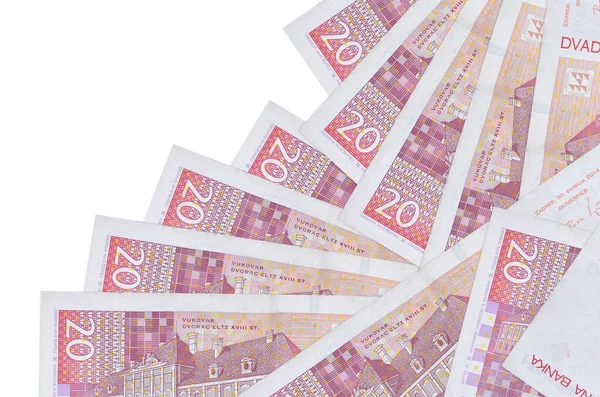 20 Hırvat kuna banknotu beyaza izole edilmiş olarak farklı sırada yatıyor. Yerel bankacılık ya da para kazanma konsepti. İş arkaplanı afişi