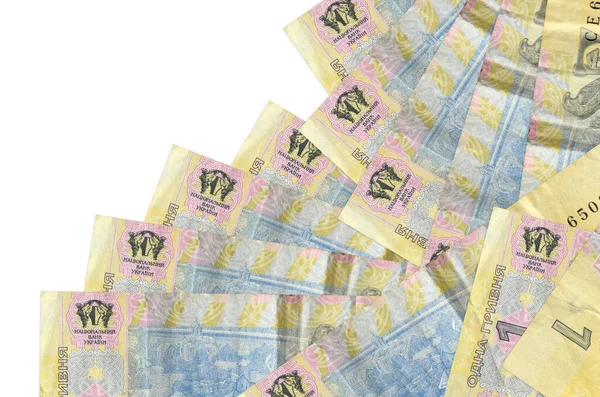 1 Ukrayna Hryvnia senedi beyaza izole edilmiş farklı bir sırayla yatar. Yerel bankacılık ya da para kazanma konsepti. İş arkaplanı afişi