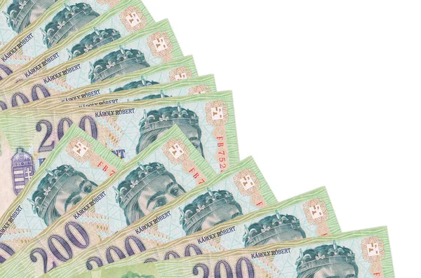 200 Macar forint banknotları beyaz arka planda izole edilmiş, fotokopi alanı da pervaneye yakın duruyor. Maaş zamanı kavramı veya finansal işlemler