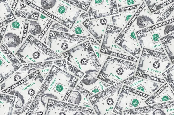 20 dolarlık banknotlar büyük yığın halinde duruyor. Zengin yaşam kavramsal geçmişi. Büyük miktarda para.