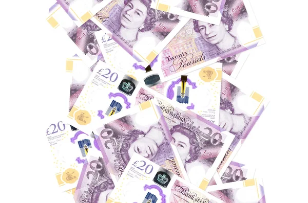 20 İngiliz sterlinli banknotlar beyazlar üzerinde izole bir şekilde uçuyor. Birçok banknot sol ve sağ tarafta beyaz kopya alanı ile düşüyor