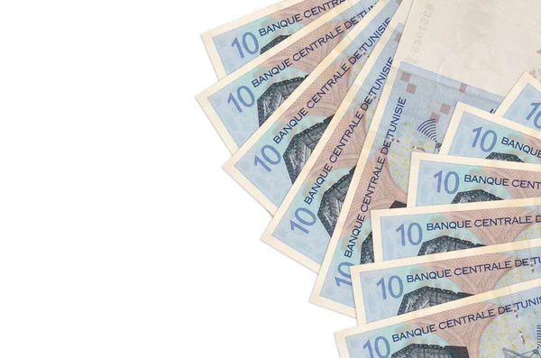 10 Tunus dinarı banknotları beyaz arka planda fotokopi alanı ile izole bir şekilde duruyor. Zengin yaşam kavramsal geçmişi. Büyük miktarda ulusal para birimi zenginliği
