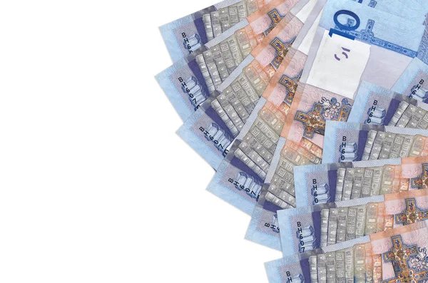 10ベラルーシのルーブル紙幣は コピースペースのある白い背景に隔離されています 豊かな人生の概念的背景 大量の国家通貨富 — ストック写真